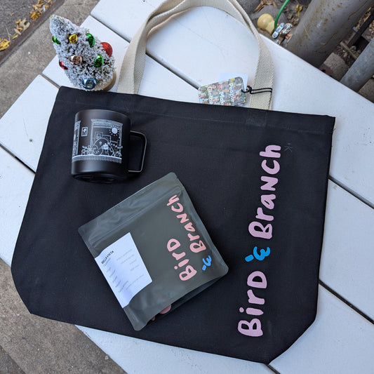 Holiday Gift of a tote bag, camp cup, and whole coffee beans