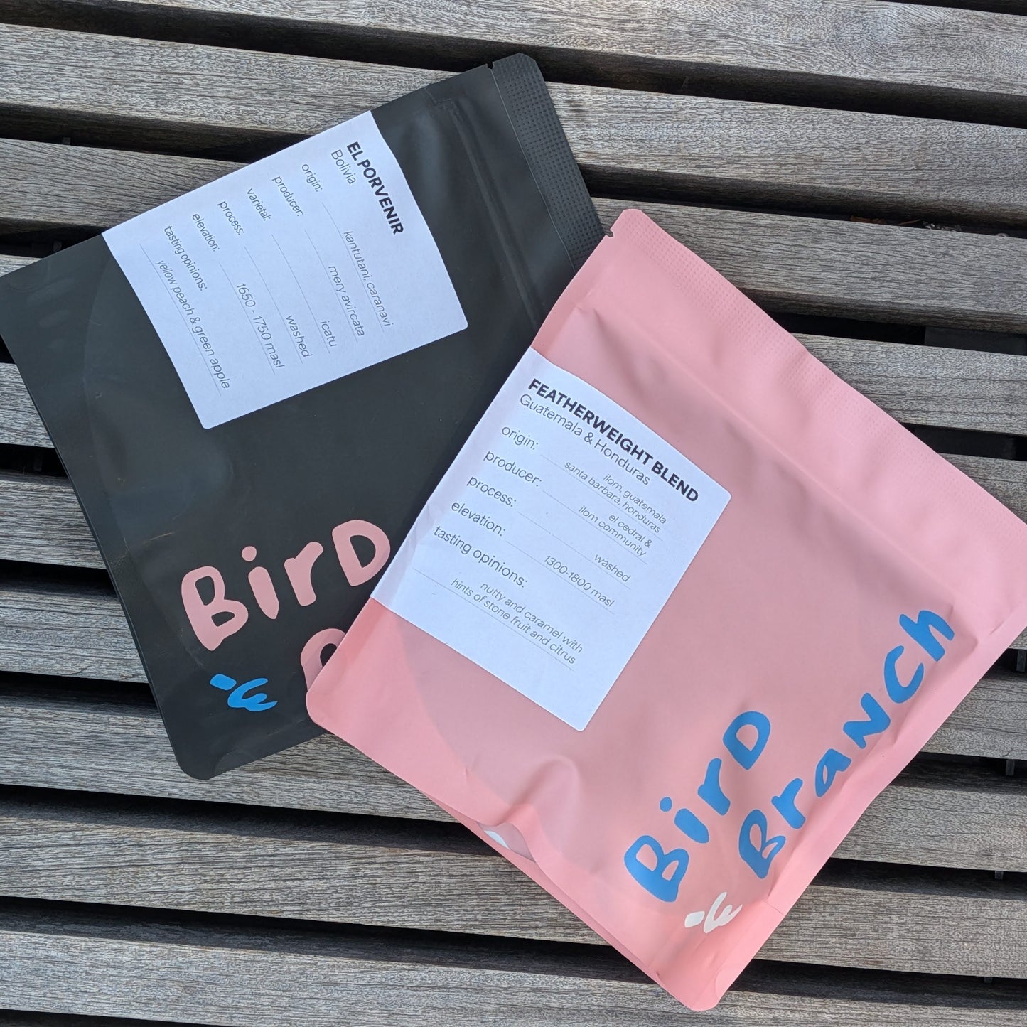 2 bags of whole bean coffee, one blend and one single origin