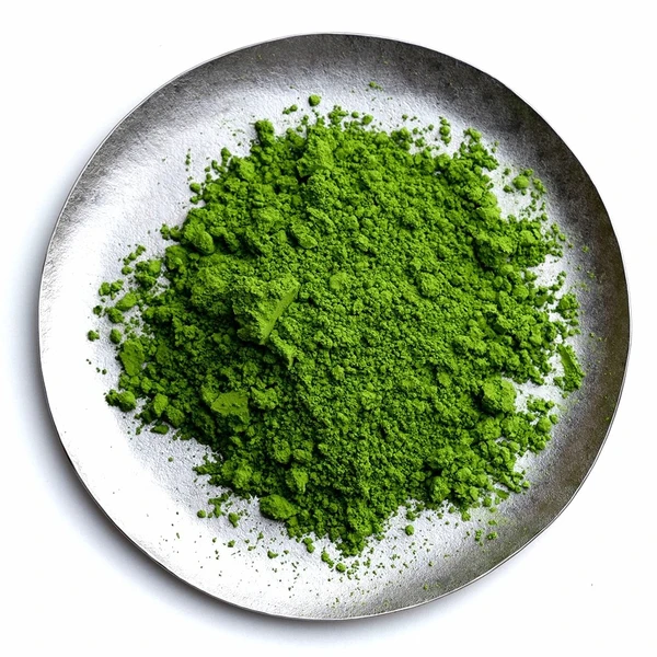 The vibrant green matcha powder